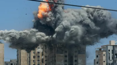 An explosion occurs following an Israeli air strike on a residential building, amid the Israel-Hamas conflict, in Nuseirat in the central Gaza Strip, July 20, 2024. REUTERS/Omar Naaman