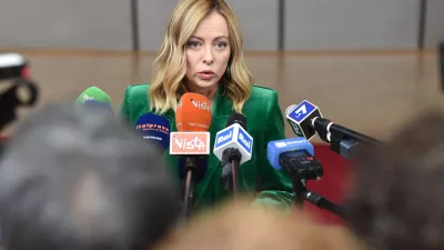 FILED - 15 December 2023, Belgium, Brussels: Italian Prime Minister Giorgia Meloni speaks to media upon her arrival to attend the second day of the EU Summit. Meloni has accused a German search-and-rescue organization of ignoring the role of human traffickers in the deaths of thousands in response to accusations she was working on a "dystopian migration policy" with Libya. Photo: Gaetan Claessens/EU COUNCIL/dpa - ATTENTION: editorial use only and only if the credit mentioned above is referenced in full