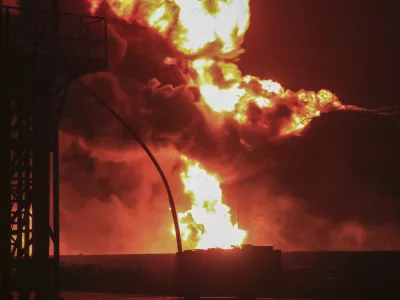 Oil tanks burn at the port in Hodeidah, Yemen, Saturday, July 20, 2024. The Israeli army said it has struck several Houthi targets in western Yemen following a fatal drone attack by the rebel group in Tel Aviv the previous day. (AP Photo)