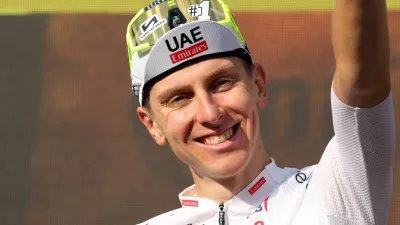 Cycling - Tour de France - Stage 20 - Nice to Col de la Couillole - Col de la Couillole, France - July 20, 2024 UAE Team Emirates' Tadej Pogacar celebrates on the podium after winning stage 20 REUTERS/Manon Cruz