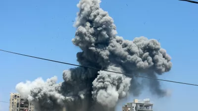 Smoke rises after an explosion following an Israeli air strike on a residential building, amid the Israel-Hamas conflict, in Nuseirat in the central Gaza Strip, July 20, 2024. REUTERS/Omar Naaman