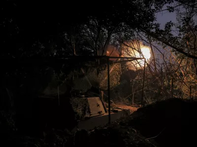 In this photo provided by Ukraine's 24th Mechanised Brigade press service, servicemen of the 24th Mechanised Brigade fire 155mm M-109 "Paladin" howitzer towards Russian forces near the frontline town of Chasiv Yar, Donetsk region, Ukraine, Saturday, July 20, 2024. (Oleg Petrasiuk/Ukrainian 24th Mechanised Brigade via AP)