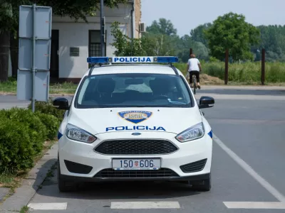 ﻿Picture of a Ford car from the Croatian police forces, also known as Hrvatska Policija or MUP, in the street of Vukovar