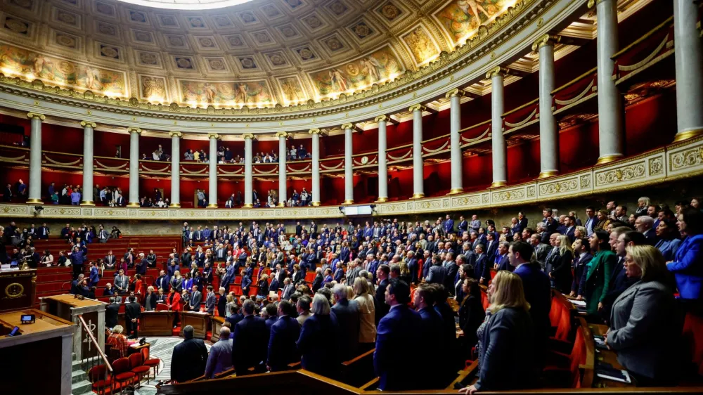 Far-left members of the parliament leave as the rest of the members of parliament sing the national anthem, while the debate on the pension reform plan has been closed at the National Assembly in Paris, France February 17, 2023. REUTERS/Sarah Meyssonnier