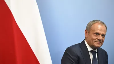 FILE - Poland's Prime Minister Donald Tusk reacts during a bilateral meeting with Britain's Prime Minister Keir Starmer, at the European Political Community meeting, at Blenheim Palace in Woodstock, southern England, Thursday, July 18, 2024. U.S. President Joe Biden's withdrawal from the U.S. presidential race injects greater uncertainty into the world. (Justin Tallis/Pool Photo via AP, File)