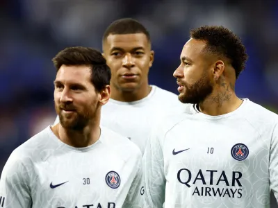 FILE PHOTO: Soccer Football - Ligue 1 - Olympique Lyonnais v Paris St Germain - Groupama Stadium, Lyon, France - September 18, 2022 Paris St Germain's Neymar, Lionel Messi and Kylian Mbappe before the match REUTERS/Stephane Mahe/File Photo