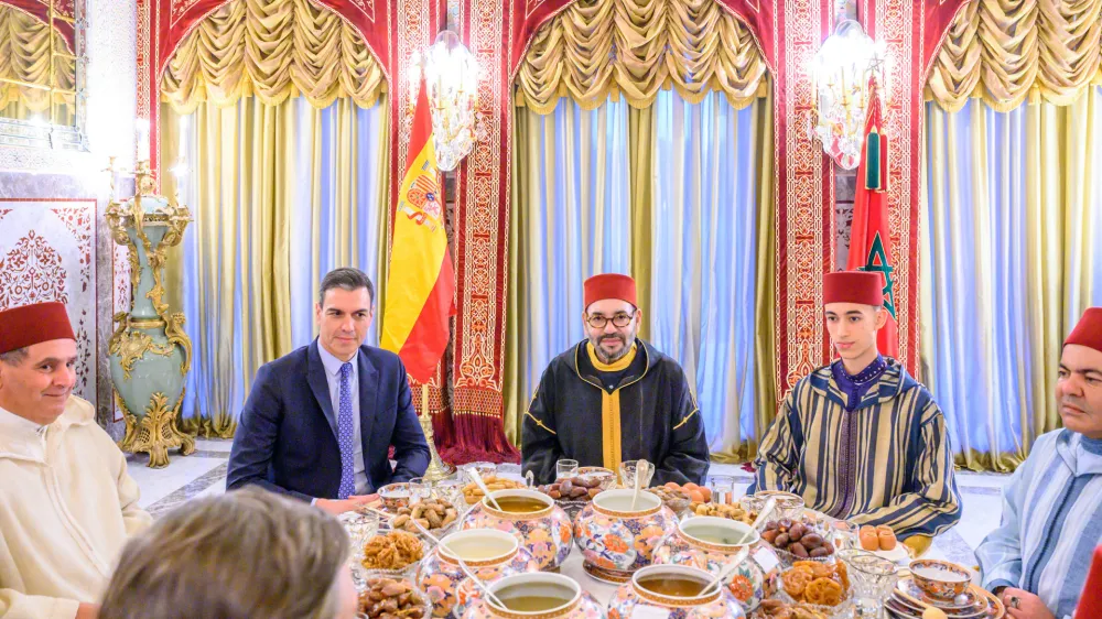 In this photo provided by the Royal Palace, Moroccan King Mohammed VI, center, Spain's Prime Minister Pedro Sanchez, second left, Crown Prince Moulay Hassan, second right, Prince Moulay Rachid, the king's brother, right, and Morocco's Prime Minister Aziz Akhannouch, left, pose before an Iftar meal, the evening meal when Muslims end their daily Ramadan fast at sunset, at the King Royal residence in Sale, Morocco, Thursday, April 7, 2022. Sanchez is on a two-day visit to Morocco that promises to mark an easing of diplomatic tensions centered on Morocco's disputed region of Western Sahara. (Moroccan Royal Palace via AP)