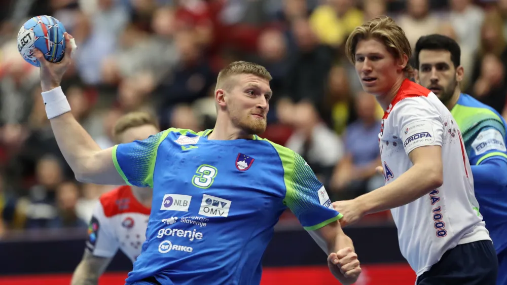 Slovenia's Blaz Blagotinsek throws the ball, during the Men's European Handball Championship main round Group 2 match between Norway and Slovenia at Malmo Arena, in Malmo, Wednesday, Jan. 22, 2020. (Andreas Hillergren/TT News Agency via AP)