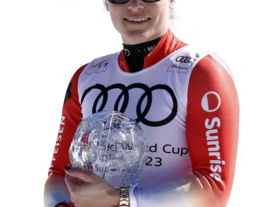 Alpine Skiing - FIS Alpine Ski World Cup - Women's Super G - Soldeu, Andorra - March 16, 2023 Switzerland's Lara Gut-Behrami celebrates with the crystal globe after winning the women's Super G for the season REUTERS/Albert Gea