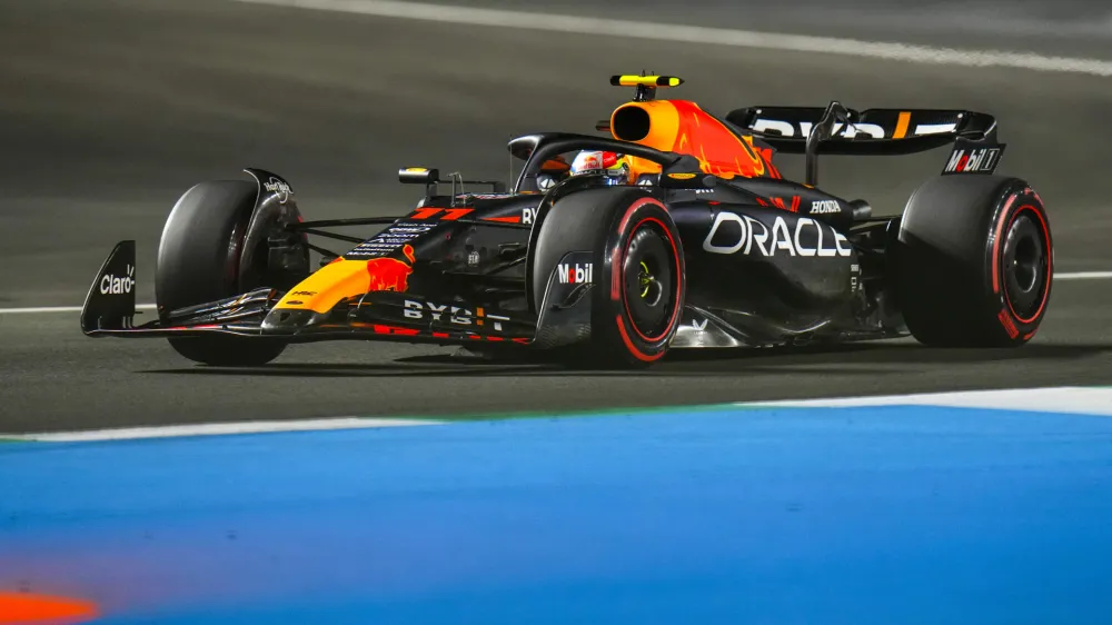 Red Bull driver Sergio Perez of Mexico steers his car during the qualifying session ahead of the Formula One Grand Prix at the Jeddah corniche circuit in Jeddah, Saudi Arabia, Saturday, March 18, 2023. (AP Photo/Hassan Ammar)