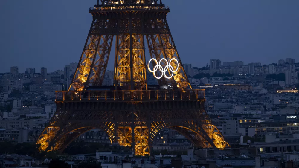 24 July 2024, France, Paris: The Olympic Rings are seen on the Eiffel tower ahead of the 2024 Paris Summer Olympic Games at in Paris. Photo: Deml Ondřej/CTK/dpa