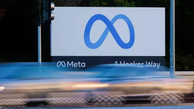 FILE PHOTO: Morning commute traffic streams past the Meta sign outside the headquarters of Facebook parent company Meta Platforms Inc in Mountain View, California, U.S. November 9, 2022. REUTERS/Peter DaSilva/File Photo