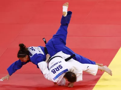 Paris 2024 Olympics - Judo - Women -48 kg Elimination Round of 32 - Champ de Mars Arena, Paris, France - July 27, 2024. Milica Nikolic of Serbia in action against Stangar Marusa of Slovenia REUTERS/Kim Kyung-Hoon