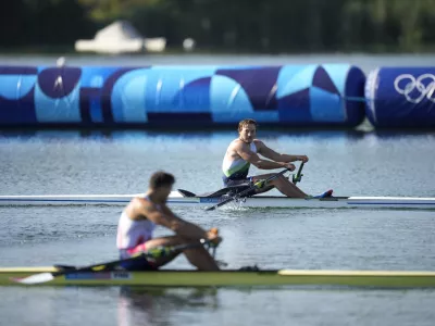 Isak Ivan Zvegelj, of Slovenia, competes in men's single scull rowing repechage at the 2024 Summer Olympics, Sunday, July 28, 2024, in Vaires-sur-Marne, France. (AP Photo/Ebrahim Noroozi)
