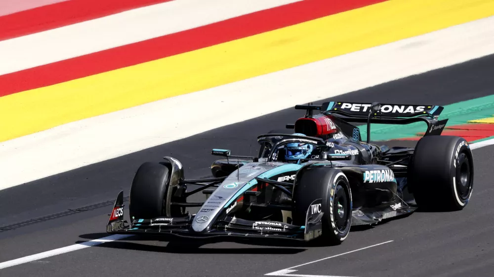 Mercedes driver George Russell of Britain steers his car during the Formula One Grand Prix at the Spa-Francorchamps racetrack in Spa, Belgium, Sunday, July 28, 2024. (AP Photo/Geert Vanden Wijngaert)