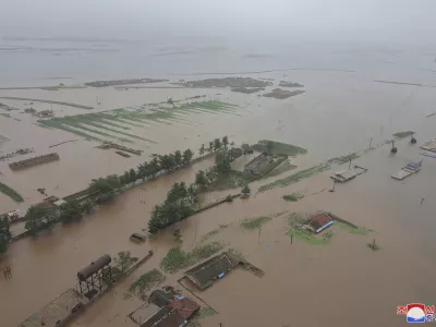 This undated photo provided on Monday, July 29, 2024 by the North Korean government, shows a flood-hit area in North Phyongan province, North Korea. Independent journalists were not given access to cover the event depicted in this image distributed by the North Korean government. The content of this image is as provided and cannot be independently verified. Korean language watermark on image as provided by source reads: "KCNA" which is the abbreviation for Korean Central News Agency. (Korean Central News Agency/Korea News Service via AP)