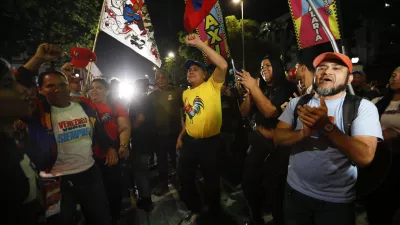 29 July 2024, Venezuela, Caracas: People celebrate on the streets after the National Electoral Council (CNE) declared Nicolas Maduro the winner of the presidential elections. The opposition did not recognize the official result and announced that Venezuela had a new president named Gonzalez Urrutia. Photo: Jeampier Arguinzones/dpa