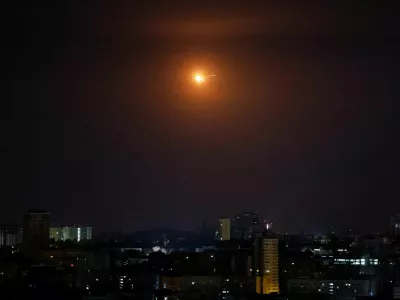 An explosion of a drone is seen in the sky over the city during a Russian drone strike, amid Russia's attack on Ukraine, in Kyiv, Ukraine July 31, 2024. REUTERS/Gleb Garanich