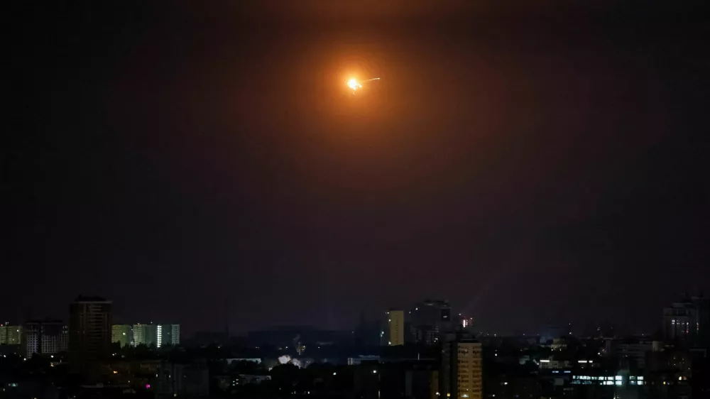 An explosion of a drone is seen in the sky over the city during a Russian drone strike, amid Russia's attack on Ukraine, in Kyiv, Ukraine July 31, 2024. REUTERS/Gleb Garanich