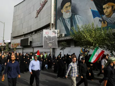 Iranians attend the funeral procession of assassinated Hamas chief, Ismail Haniyeh in Tehran, Iran, August 1, 2024. Majid Asgaripour/WANA (West Asia News Agency) via REUTERS ATTENTION EDITORS - THIS IMAGE HAS BEEN SUPPLIED BY A THIRD PARTY.