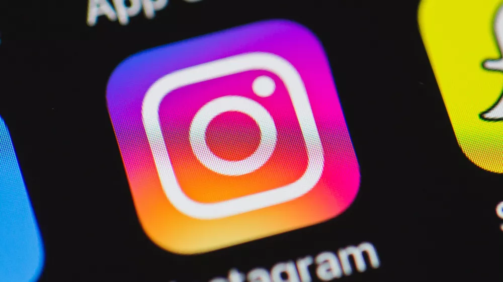 FILED - 17 May 2016, North Rhine-Westphalia, Duesseldorf: The Instagram logo is seen on an Apple iPhone 6. Photo: Rolf Vennenbernd/dpa