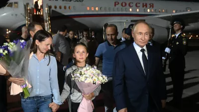 epa11517344 Russian President Vladimir Putin (R) meets Russian citizens released after the Russian-US prisoner swap in Turkiye at Vnukovo International Airport in Moscow, Russia, 01 August 2024. On August 01, Ankara hosted the Russian-US exchange of 26 individuals held in prisons in the United States, Germany, Poland, Slovenia, Norway, Russia, and Belarus. Ten of the prisoners exchanged, including two minors, went to Russia, 13 to Germany, and three to the US. Those returned to Russia include Artem and Anna Dultsev with their children, Vadim Krasikov, Pavel Rubtsov, Mikhail Mikushin, Roman Seleznev, Vladislav Klyushin, and Vadim Konoshchenok. EPA/MIKHAIL VOSKRESENSKIY/SPUTNIK/KREMLIN POOL MANDATORY CREDIT EPA-EFE/MIKHAIL VOSKRESENSKIY/SPUTNIK/KREMLIN POOL MANDATORY CREDIT