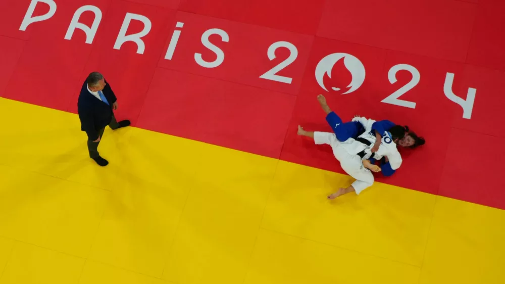 Paris 2024 Olympics - Judo - Women -70 kg Final - Champ-de-Mars Arena, Paris, France - July 31, 2024. Barbara Matic of Croatia in action against Miriam Butkereit of Germany. REUTERS/Kim Kyung-Hoon