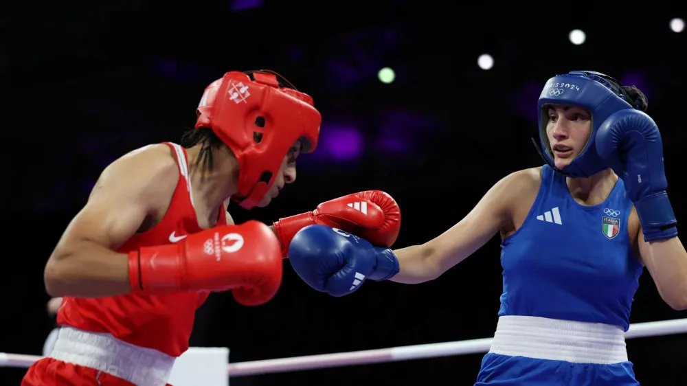 Paris 2024 Olympics - Boxing - Women's 66kg - Prelims - Round of 16 - North Paris Arena, Villepinte, France - August 01, 2024. Imane Khelif of Algeria and Angela Carini of Italy in action. REUTERS/Isabel Infantes