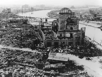 ﻿epa000494916 A handout photograph of the Hiroshima A-bomb Dome photographed by U.S. military following the atomic bomb drop on Hiroshima that killed over 140,000 people on 06 August 1945. The building, originally Hiroshima Prefectural Industrial Promotion Hall, was just160 meters northwest of the hypocenter. The skeletal structure of the dome standing above the city's ruins was a conspicuous landmark and has now become known officially as the A-bomb Dome. 06 August 2005 marks the 60th anniversary of the Hiroshima A-bomb blast. EPA/A PEACE MEMORIAL MUSEUMHANDOUT