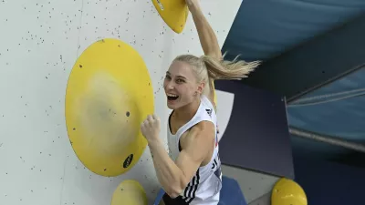 Slovenian climber Janja Garnbret cheers during the European Championship, combination, women, bouldering, final in Munich, Germany, Wednesday, Aug.17, 2022. (Angelika Warmuth/dpa via AP)