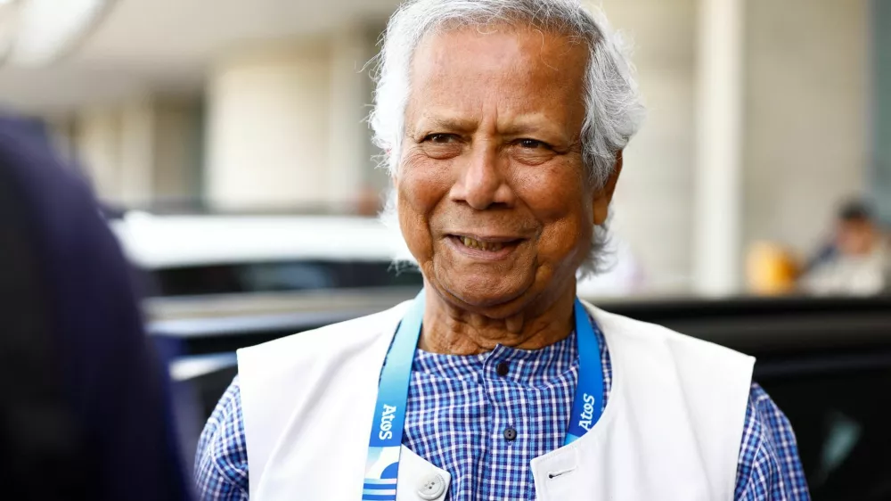 Nobel laureate Muhammad Yunus, who was recommended by Bangladeshi student leaders as the head of the interim government in Bangladesh, reacts at Paris Charles de Gaulle airport in Roissy-en-France, France August 7, 2024. REUTERS/Abdul Saboor