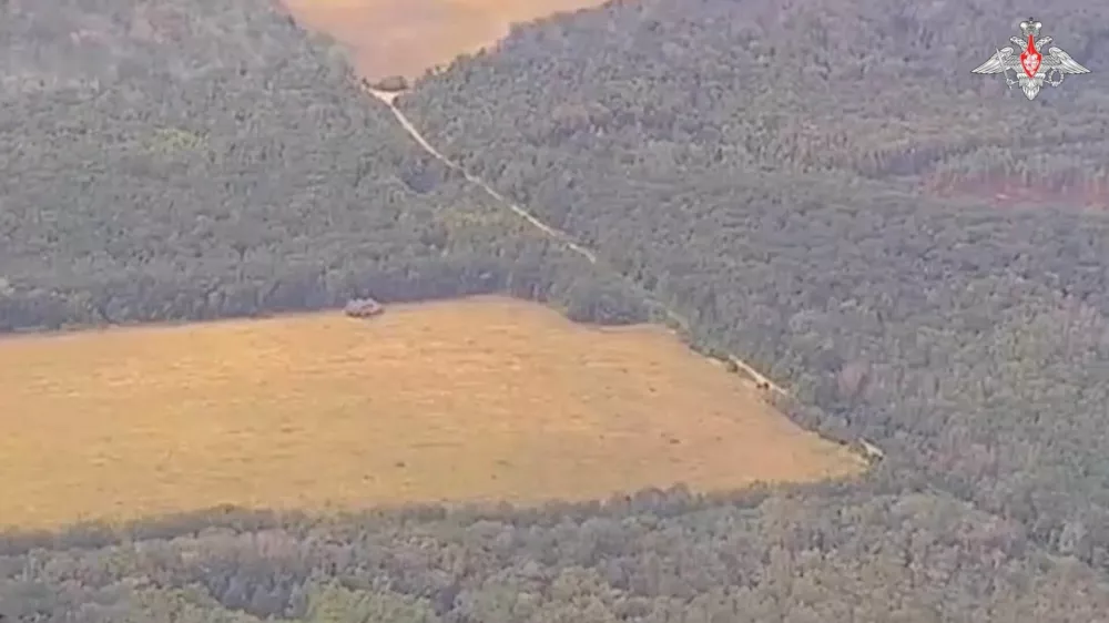 A view shows what is said to be a Russian army strike on Ukrainian military hardware in the area bordering Ukraine in the Kursk Region, Russia, in this still image from video released August 7, 2024. Russian Defence Ministry/Handout via REUTERS ATTENTION EDITORS - THIS IMAGE HAS BEEN SUPPLIED BY A THIRD PARTY. NO RESALES. NO ARCHIVES. MANDATORY CREDIT. WATERMARK FROM SOURCE.