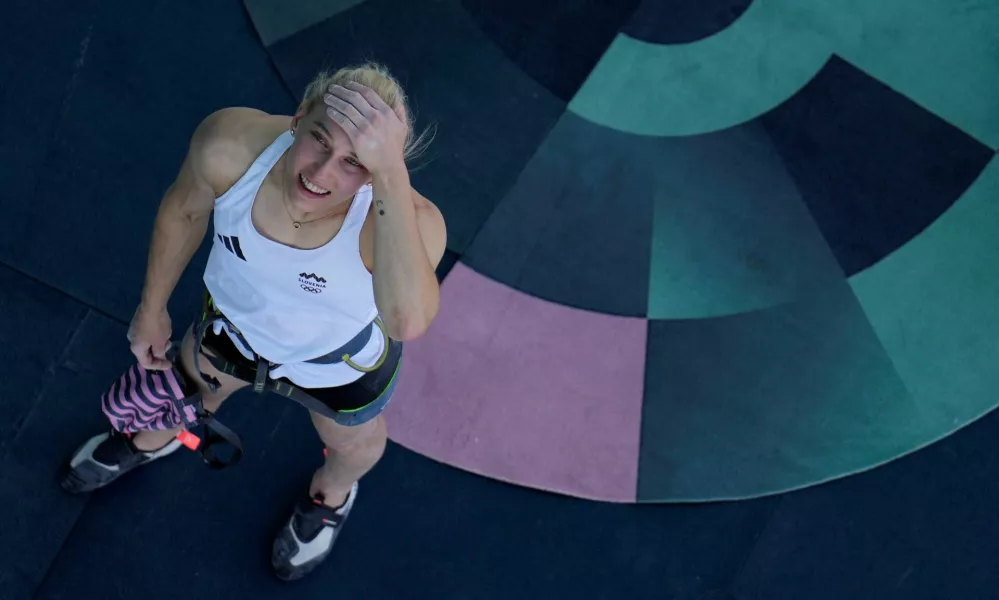 Paris 2024 Olympics - Climbing - Women's Boulder & Lead, Final Lead - Le Bourget Sport Climbing Venue, Le Bourget, France - August 10, 2024. Erin Janja Garnbret of Slovenia reacts Pool via REUTERS/Chrisophe Ena