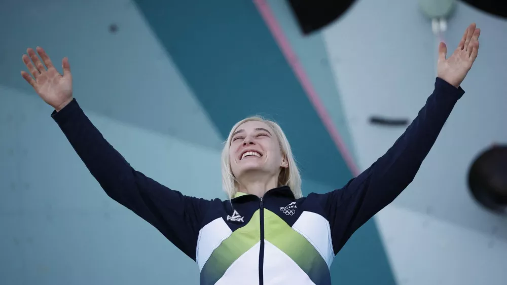 Paris 2024 Olympics - Climbing - Women's Boulder & Lead Victory Ceremony - Le Bourget Sport Climbing Venue, Le Bourget, France - August 10, 2024. Gold medallist Janja Garnbret of Slovenia celebrates on the podium. REUTERS/Benoit Tessier