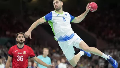 Slovenia's Blaz Janc is in action during the bronze medal handball match between Spain and Slovenia at the 2024 Summer Olympics, Sunday, Aug. 11, 2024, in Villeneuve-d'Ascq, France. (AP Photo/Brian Inganga)