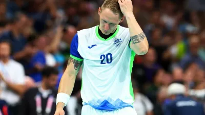 Paris 2024 Olympics - Handball - Men's Bronze Medal Match - Spain vs Slovenia - Lille, Pierre Mauroy Stadium, Villeneuve-d'Ascq, France - August 11, 2024. Tilen Kodrin of Slovenia looks dejected after Slovenia lose the match REUTERS/Bernadett Szabo