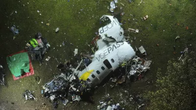 The debris at the site where an airplane crashed with 61 people on board, in Vinhedo, Sao Paulo state, Brazil, early on Saturday, Aug. 10, 2024. Brazilian authorities are working to piece together what exactly caused the plane crash in Sao Paulo state the previous day, killing all 61 people aboard. (AP Photo/Andre Penner)