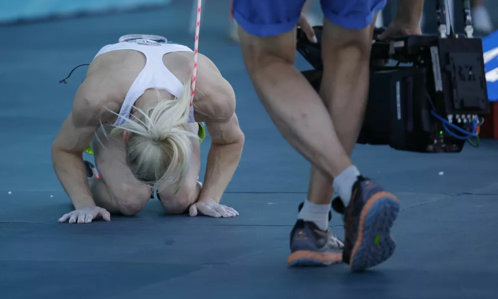 Paris 2024 Olympics - Climbing - Women's Boulder & Lead, Final Lead - Le Bourget Sport Climbing Venue, Le Bourget, France - August 10, 2024. Erin Janja Garnbret of Slovenia celebrates after winning the gold REUTERS/Anushree Fadnavis