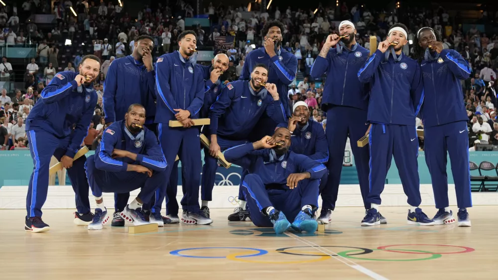 Košarkarji ZDA so se močno razveselili zmage na olimpijskem turnirju, saj so zavedali, kako močna je bila konkurenca. Foto: AP