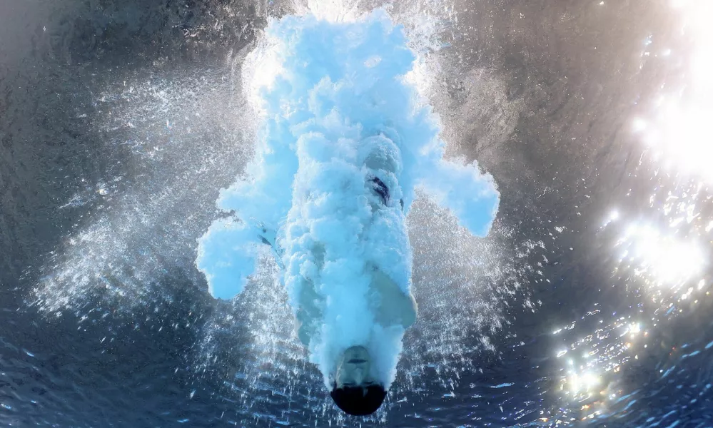 Paris 2024 Olympics - Diving - Men's 10m Platform Final - Aquatics Centre, Saint-Denis, France - August 10, 2024. Nathan Zsombor-Murray of Canada in action. REUTERS/Stefan Wermuth   TPX IMAGES OF THE DAY