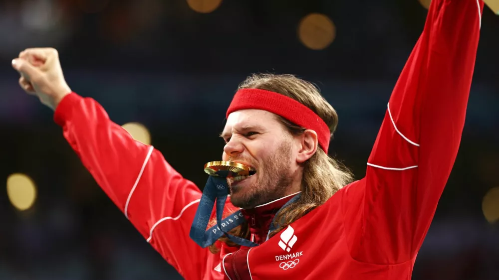 Danski rokometaš Mikkel Hansen se je veselil že druge zlate kolajne na olimpijskih igrah. Foto:  Reuters