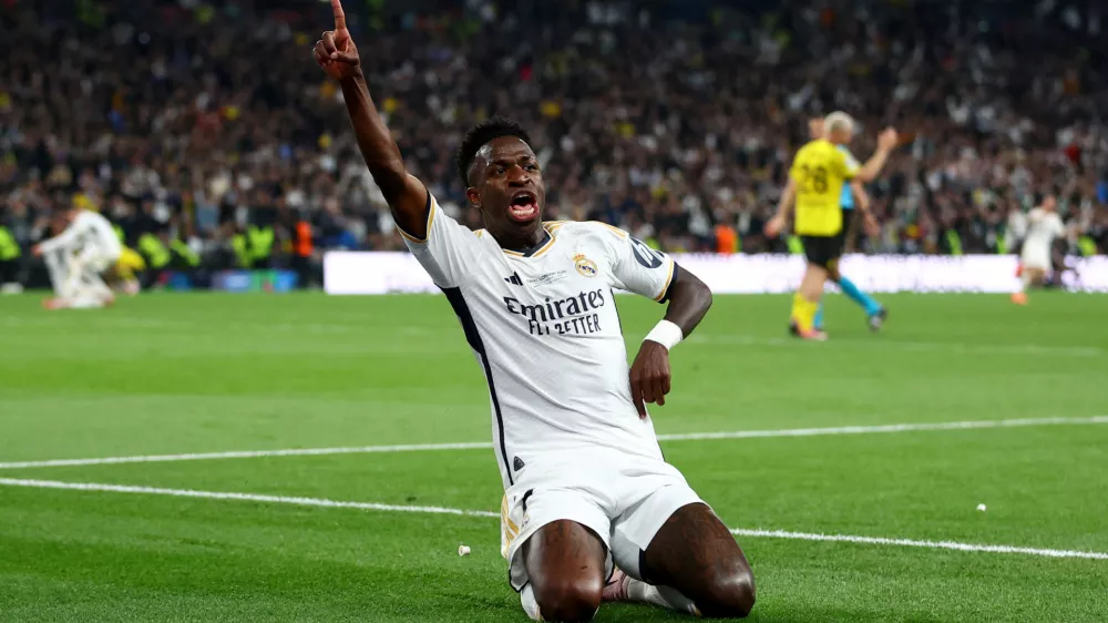 Soccer Football - Champions League - Final - Borussia Dortmund v Real Madrid - Wembley Stadium, London, Britain - June 1, 2024 Real Madrid's Vinicius Junior celebrates scoring their second goal REUTERS/Carl Recine   TPX IMAGES OF THE DAY