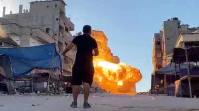 FILE PHOTO: Flames rise following an Israeli strike on a residential building, amid the ongoing conflict between Israel and Hamas, in Gaza City, in this screen grab taken from a video, August 11, 2024. Reuters TV via REUTERS/File Photo