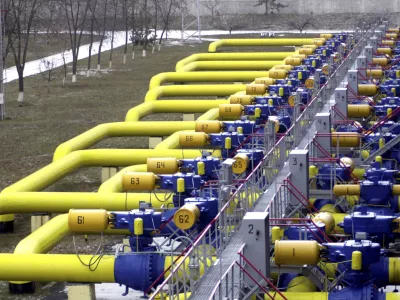 FILE - A set of pipes in a gas storage and transit point in Boyarka, just outside Kiev, Ukraine, Jan. 3, 2006. (AP Photo/Sergei Chuzavkov, File)