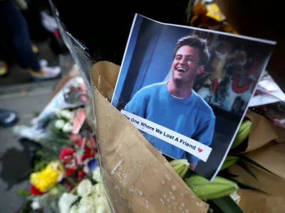 FILE PHOTO: A makeshift memorial for actor Matthew Perry, the wise-cracking co-star of the 1990s hit television sitcom "Friends," who was found dead at his Los Angeles home October 28, is pictured on Bedford Street in Manhattan in New York City, U.S., October 30, 2023. REUTERS/Mike Segar/File Photo