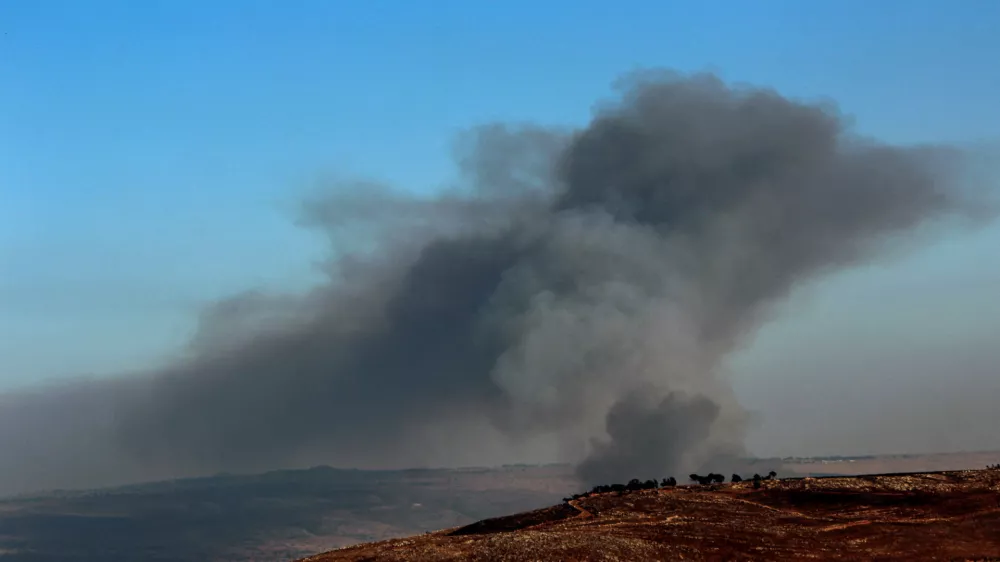 30 July 2024, Lebanon, Qliyaa: Heavy smoke billows over the Israeli northern settlement of Beit Hillel after it was attacked by rockets fired by pro-Iranian Hezbollah militants from south Lebanon amid soaring tensions between pro-Iranian Hezbollah militants and Israeli forces. Photo: STR/dpa