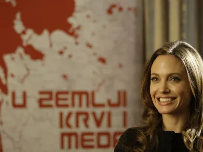 Actress Angelina Jolie answers question during an interview with Associated Press, in Sarajevo, Bosnia, on Wednesday, Feb. 15, 2012. Angelina Jolie visited Bosnia for the premiere of her movie "In the land of Blood and Honey". Angelina Jolie said Wednesday working as a director has rekindled her love for the film industry, even if it was something of a personal artistic rebellion. Jolie told The Associated Press in Sarajevo that she was starting to feel "disheartened" and uninspired by her acting roles. She knew she wanted to use film as a medium to deal with weighty matters, such as human rights abuses. (AP Photo/Amel Emric)