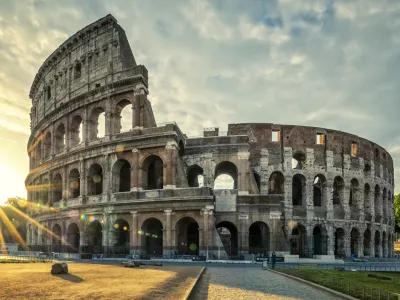 ﻿View of Colloseum at sunrise, Italy.