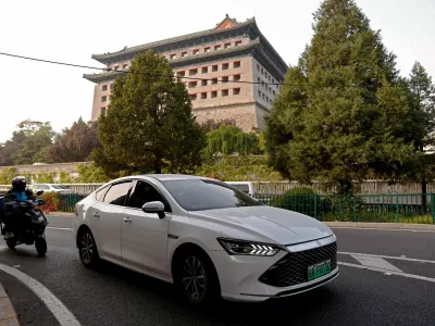 FILE PHOTO: FILE PHOTO: A BYD's electric vehicle (EV) Qin moves on a street in Beijing, China October 31, 2023. REUTERS/Tingshu Wang/File Photo/File Photo