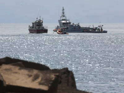 Emergency services work near the scene where a sailboat sank in the early hours of Monday off the coast of Porticello, near the Sicilian city of Palermo, Italy, August 19, 2024. REUTERS/Igor Petyx